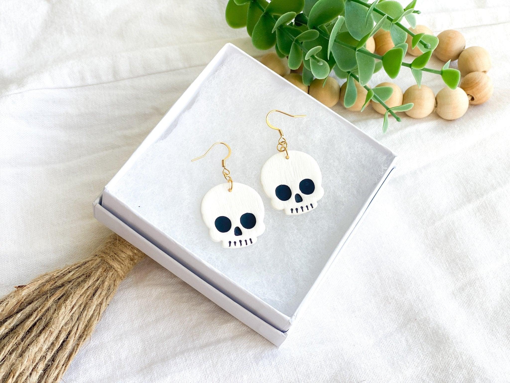 Surgical steel skull on sale earrings