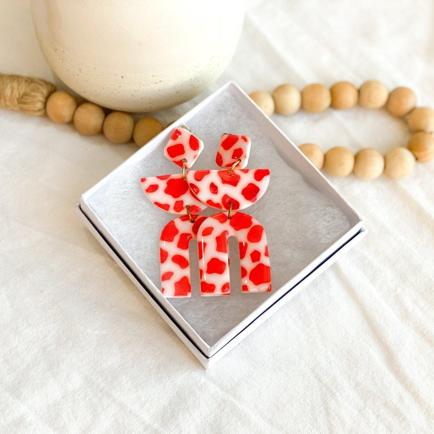 Cow Print Clip On Earrings – Triple Dangle Fun in Classic Black & Bold Red with Silicone Comfort Covers - Harbor to Gulf Co.