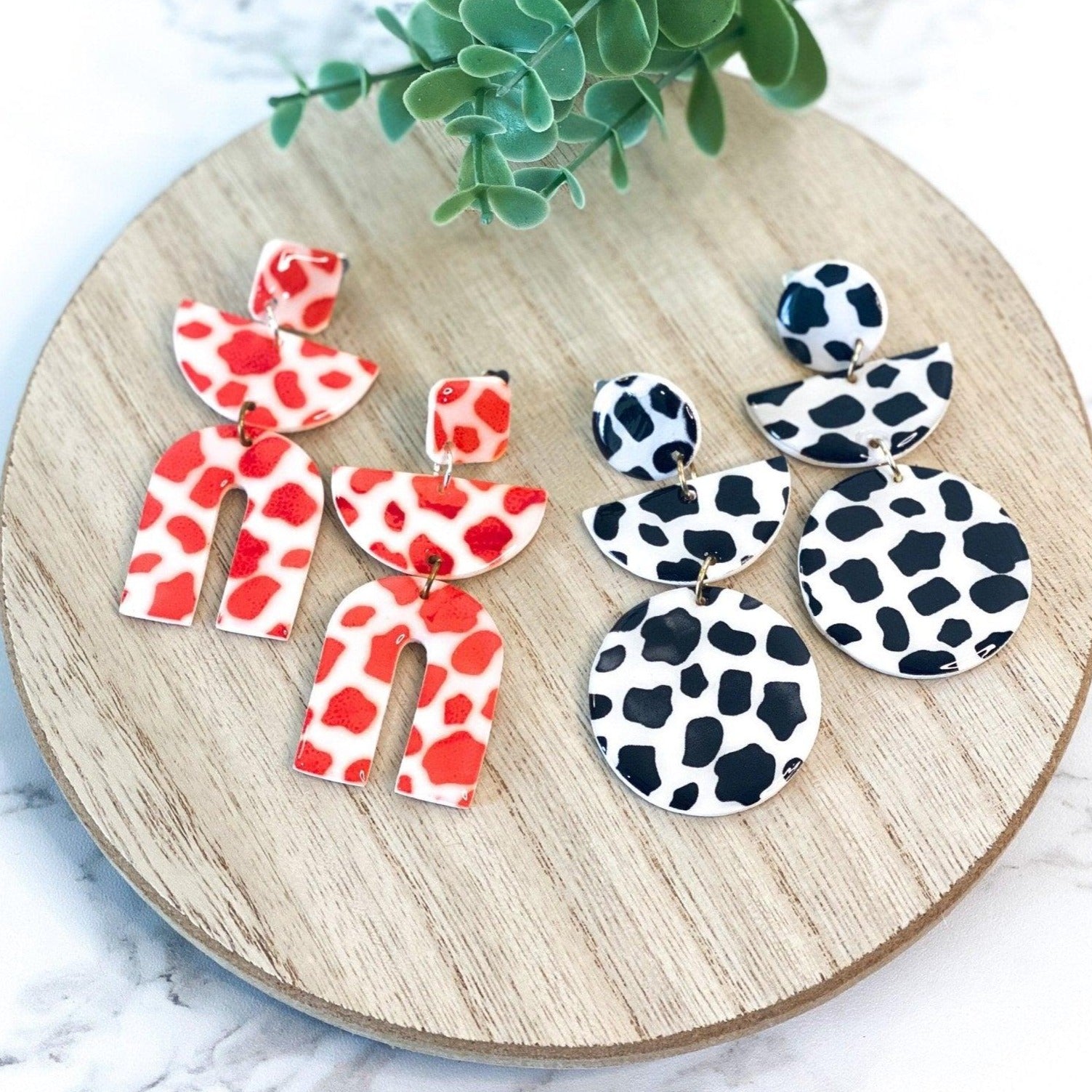 Cow Print Clip On Earrings – Triple Dangle Fun in Classic Black & Bold Red with Silicone Comfort Covers - Harbor to Gulf Co.