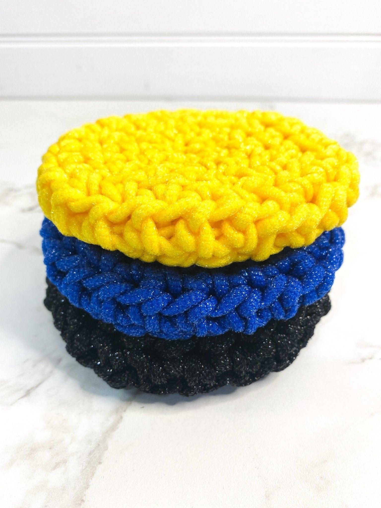 Yellow, Blue and Black handmade Crochet Dish Scrubbies Stacked on Top of Each Other