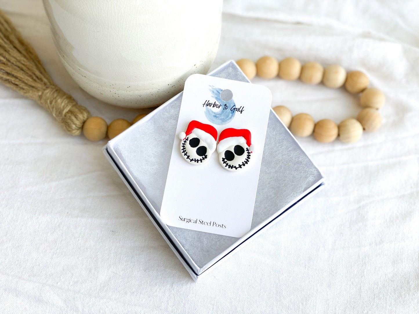 Handmade Jack Skellington with Santa Claus Hat Studs On Earring Card That States Surgical Steel Posts In White Gift Box