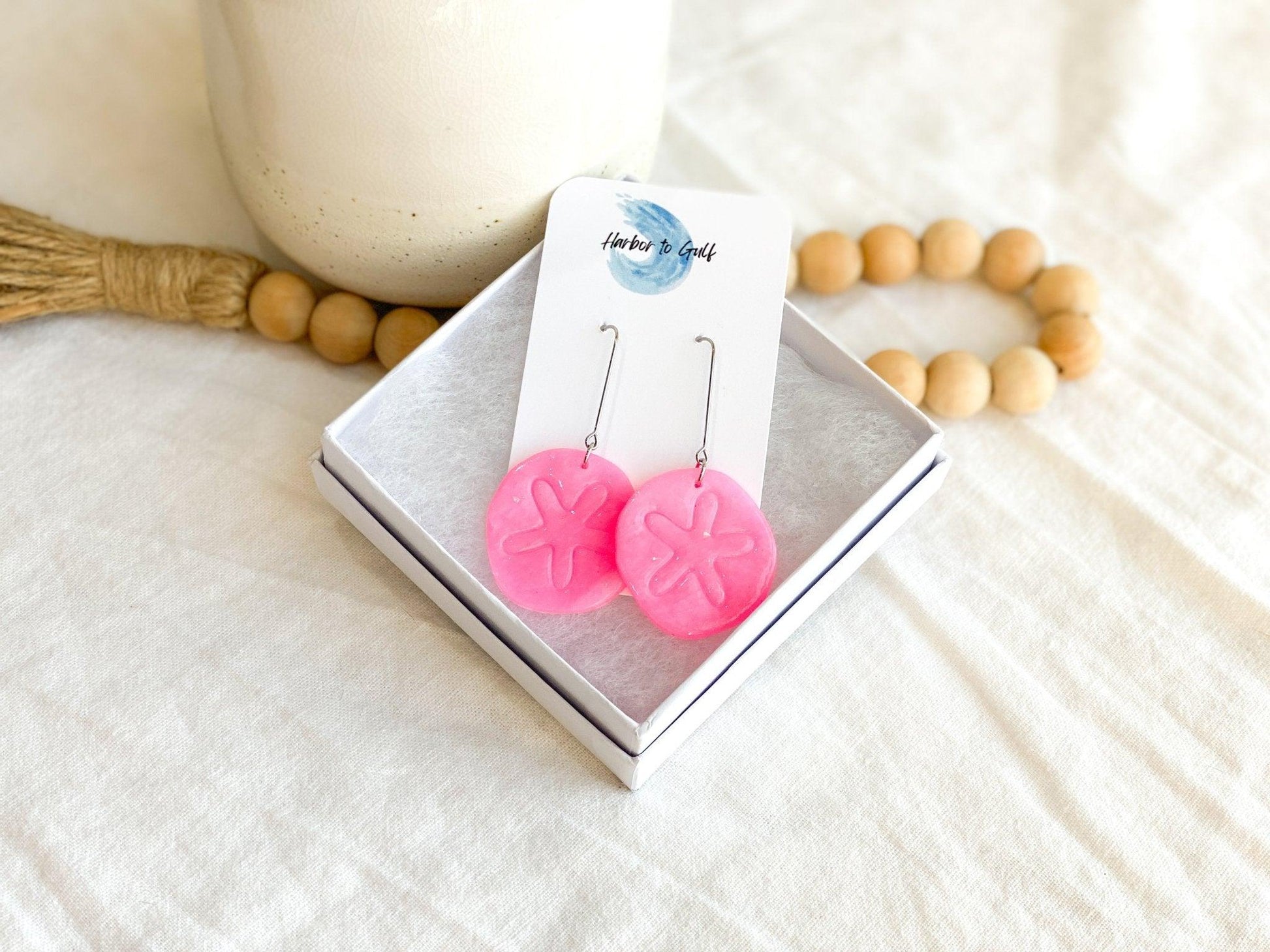 Handmade Bright Pink Sand Dollar Earrings with Long Surgical Steel Ear Wires on Harbor to Gulf Earring Card in White Gift Box