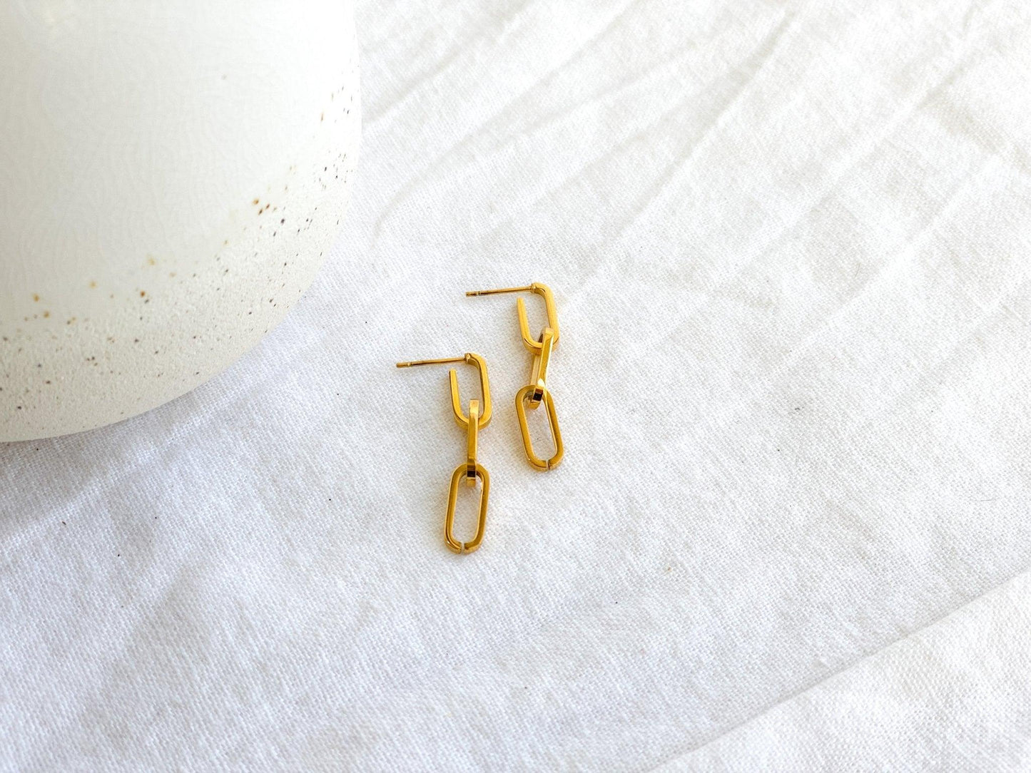 Small Gold Paperclip Chain Dangle Earrings with Surgical Steel Posts on White Linen Cloth