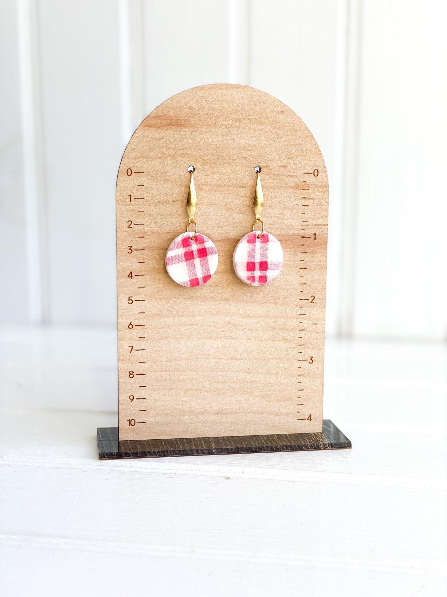 Handmade Red Plaid Earrings with Gold Surgical Steel Posts on Wood Earring Measurement Stand