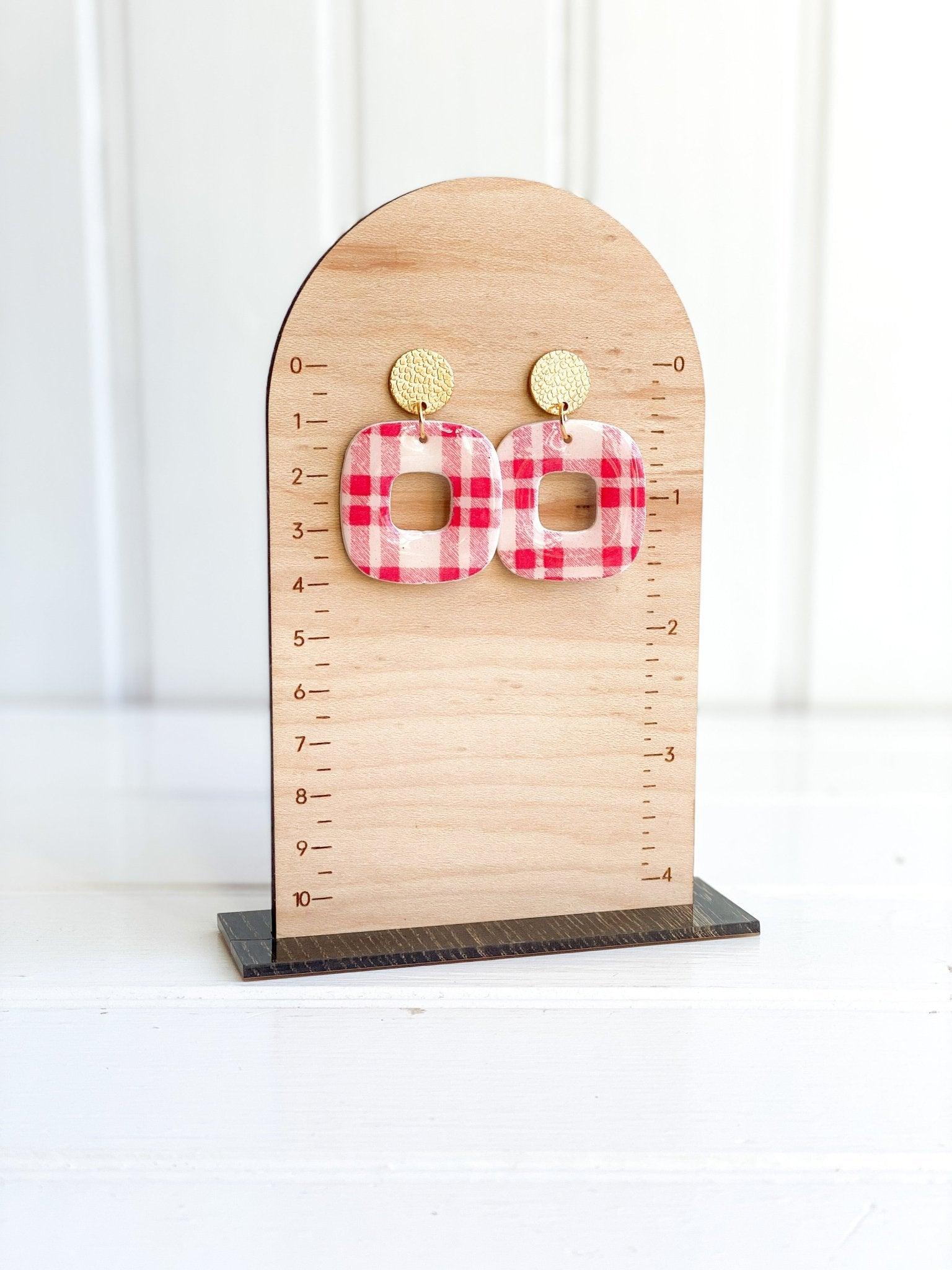 Handmade Red Plaid Earrings with Gold Surgical Steel Posts on Wood Earring Measurement Stand