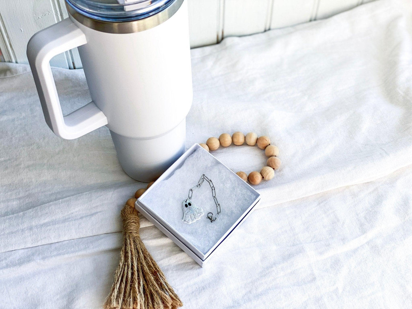 Sparkly Ghost Stanley Cup Charm Attached To Silver Stainless Steel Chain In White Gift Box