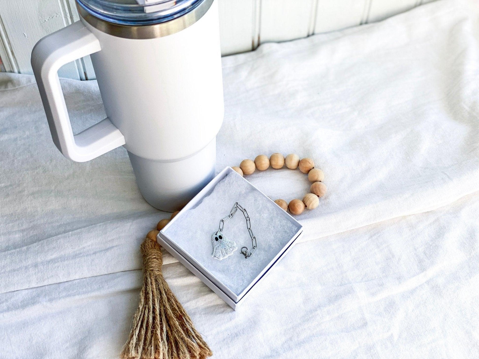 Sparkly Ghost Stanley Cup Charm Attached To Silver Stainless Steel Chain In White Gift Box